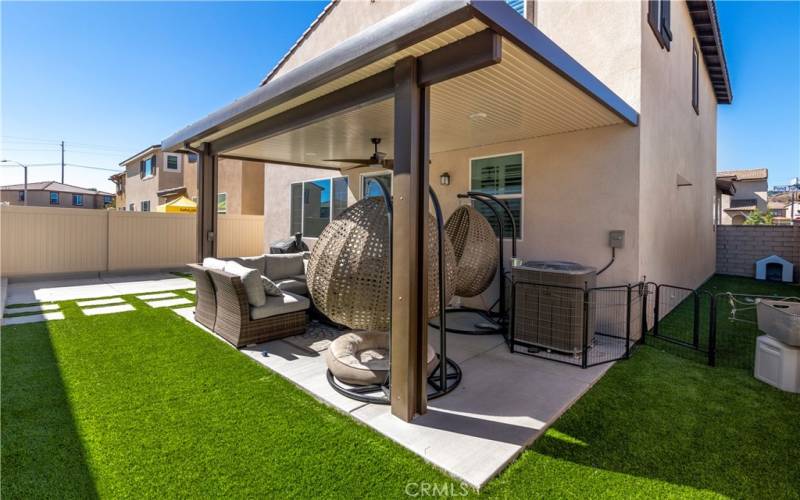 Newly landscaped backyard with no maintenance artificial turf