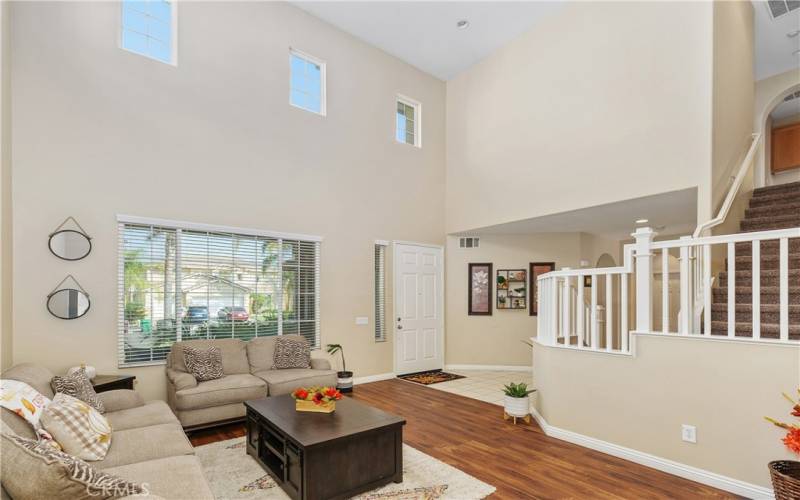 LIVING ROOM WITH TWO STORY CEILINGS