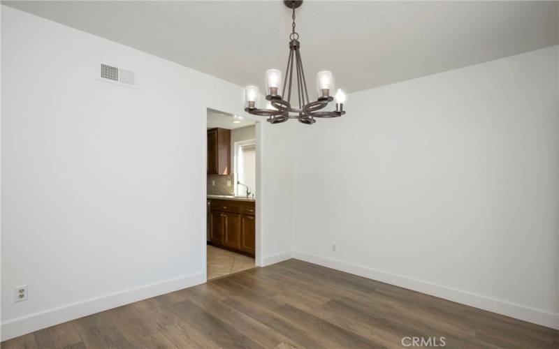 Formal dining area adjacent to kitchen