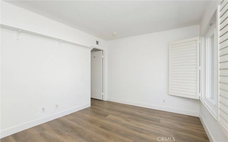 Bedroom #1 - Spacious with plantation shutters, window overlooks front yard