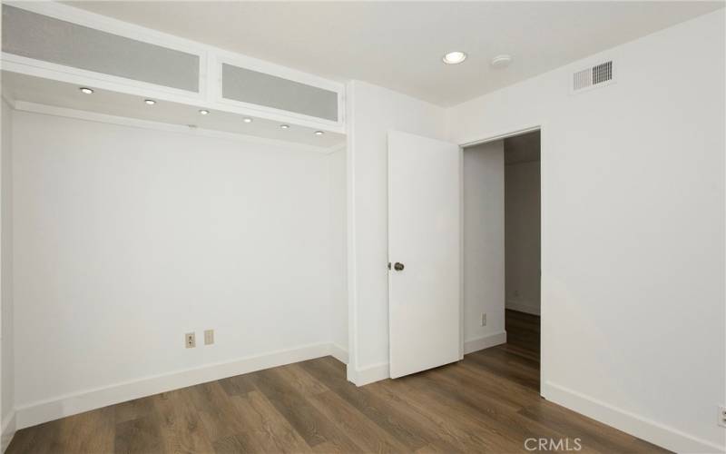 Bedroom #2 (used as an office) with recessed lighting