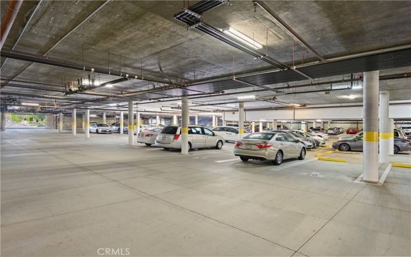 One assigned parking space in the gated HOA garage