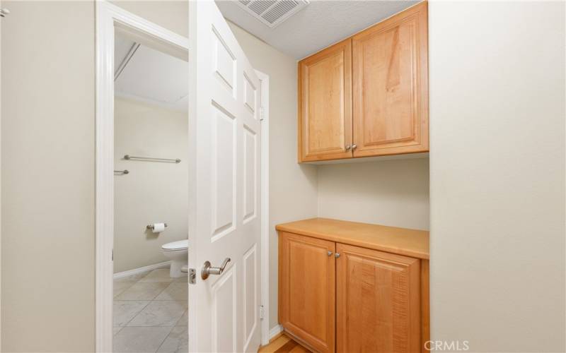 Extra cabinetry next to the Laundry and Bath