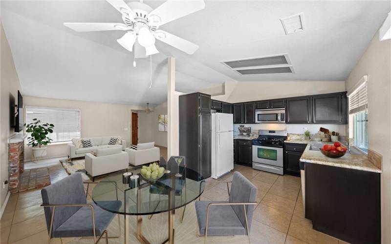 kitchen and eat area adjoining the spacious vaulted living room