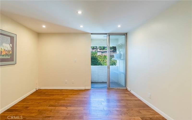 office-den, balcony view, wood floors