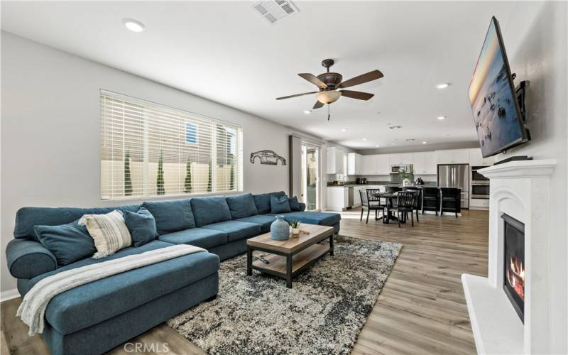 Opposite side of family room looking thru to dining area and kitchen