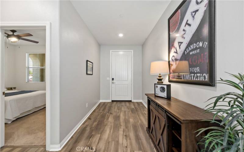 Entry hallway w vinyl plank flooring throughout the 1st floor