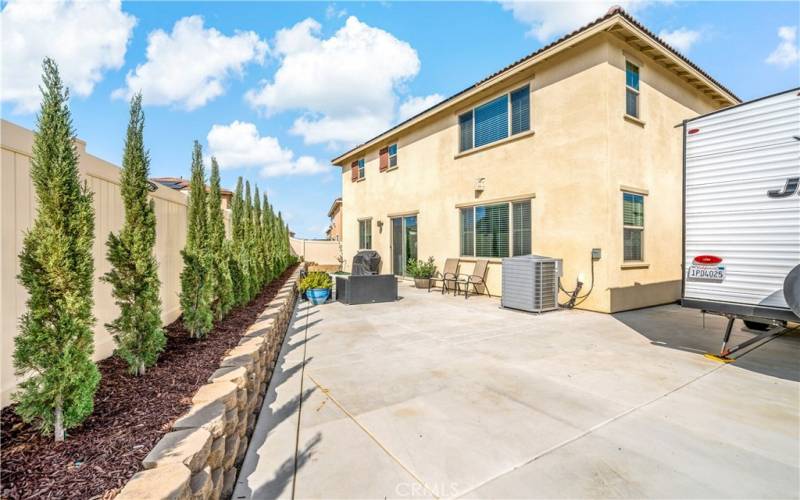 Patio area and RV parking area to the right