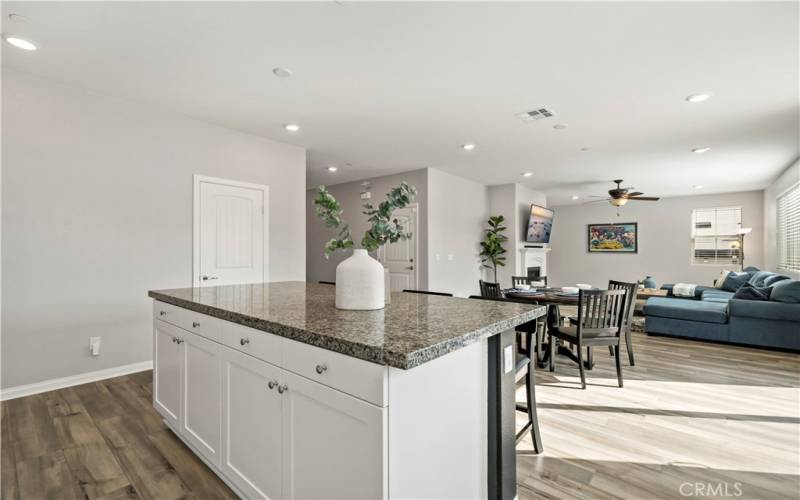 Kitchen looking thru to dining area and family room