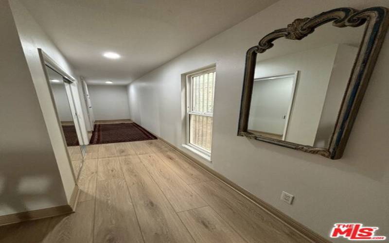 Hallway with two large bedrooms