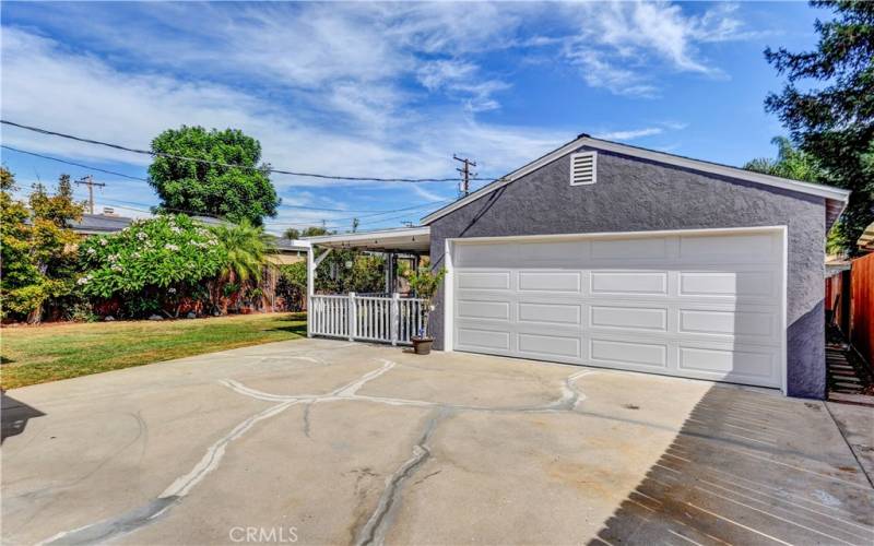 2 Car detached garage with epoxy floors and a covered patio attached