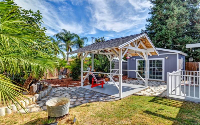 The gazebo and storage shed are both on concrete foundations and outfitted with power