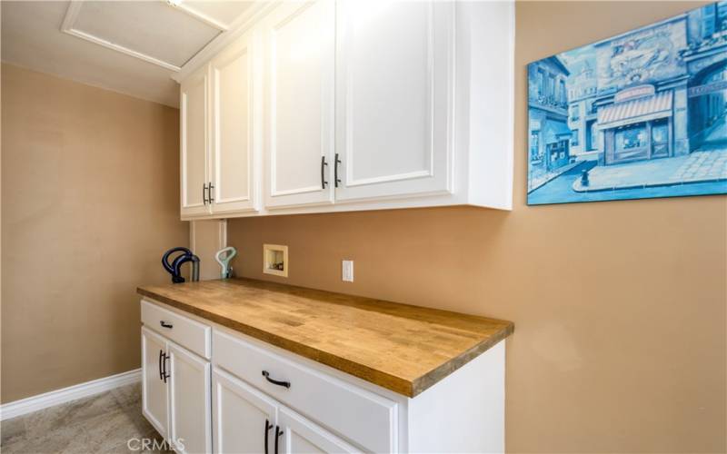 Originally the laundry room, this is now an oversized pantry and great storage space