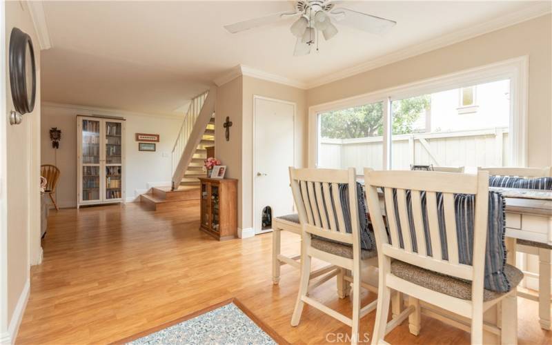 Dining area with coat closet.