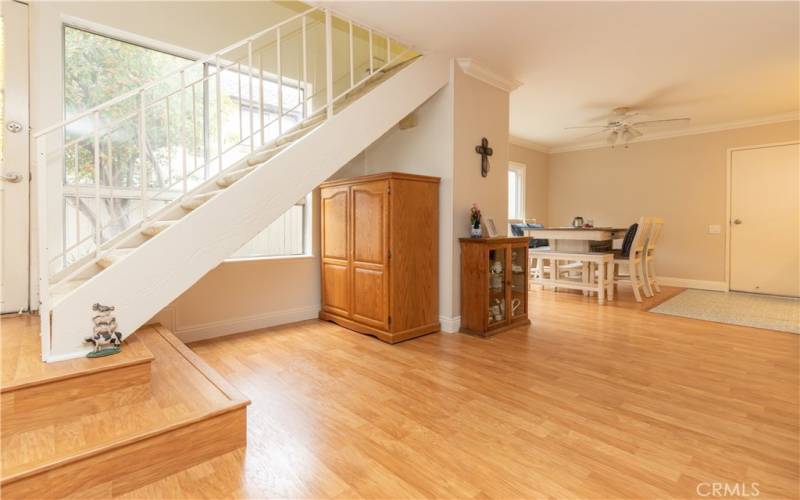 Entry window and open stairway.