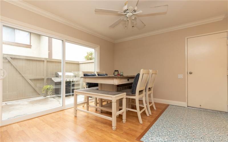 Sliding doors to patio, and garage door just off the dining room.