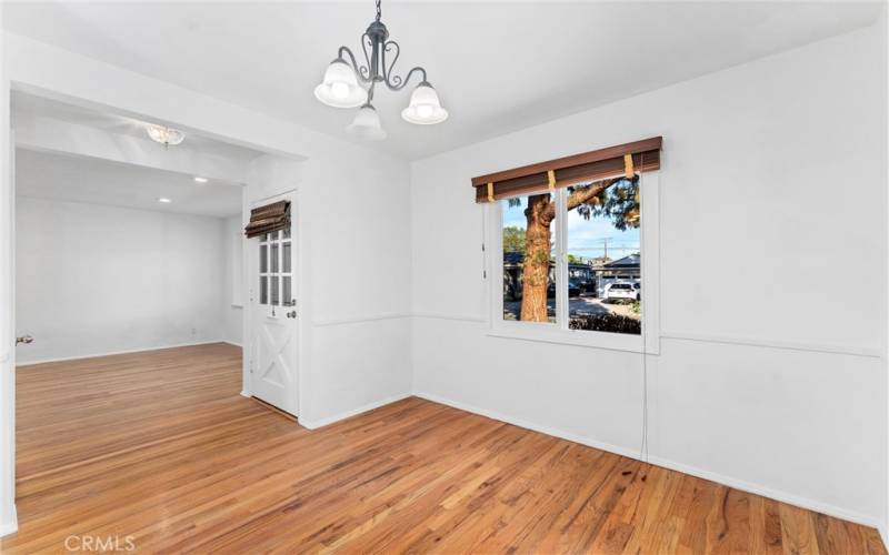 View of front door from interior, lots of natural light!