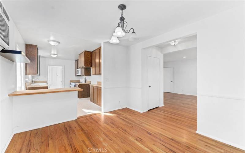 View of kitchen from breakfast nook/dining area