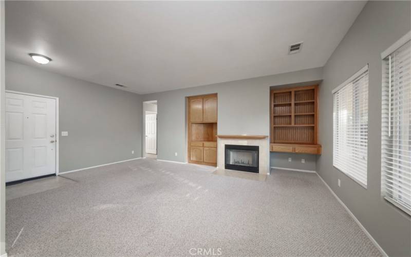 Fireplace area.  WOOD BUILT INS