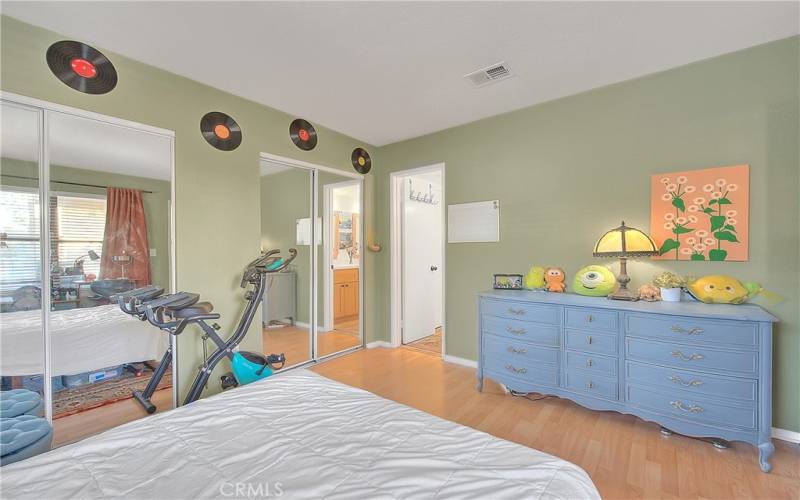 Master bedroom has two large closets, laminate flooring