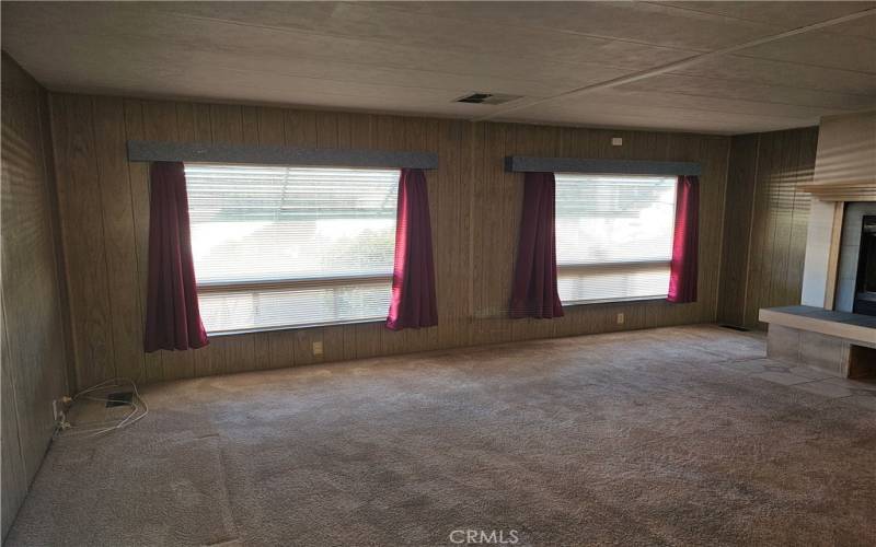 living room with nice windows for natural light