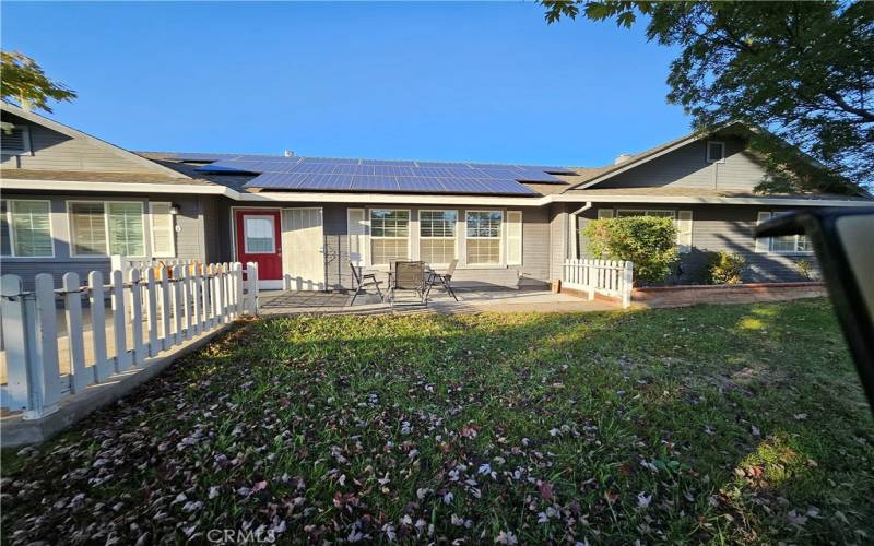 Front yard and entry with cement patio