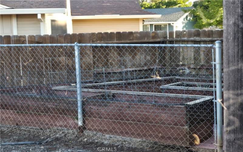 Side fenced in garden area