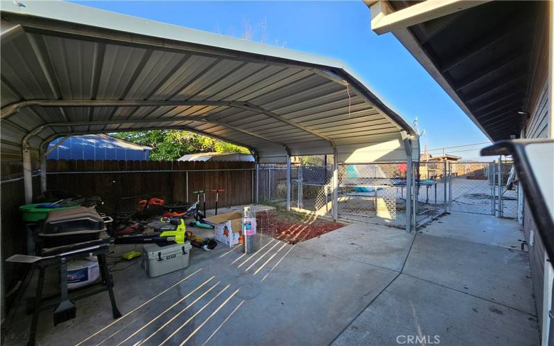 Carport covered area on left side back yard