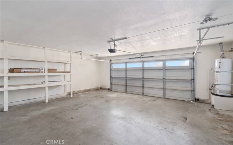 2 car attached garage, with shelving