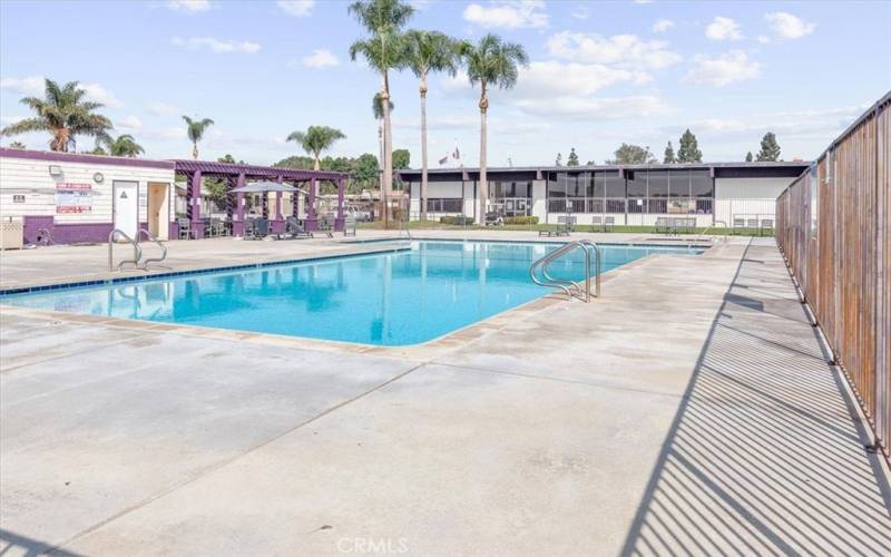 The community pool provides a refreshing retreat for residents,It's the perfect spot to cool off during warm days, socialize with neighbors, or enjoy a family swim