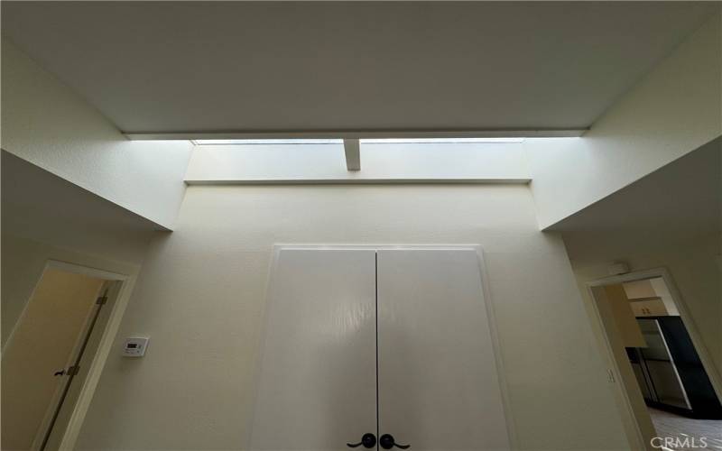 Sky light brings in Natural light to the home and makes it very nice and Bright. Located by the entry door.