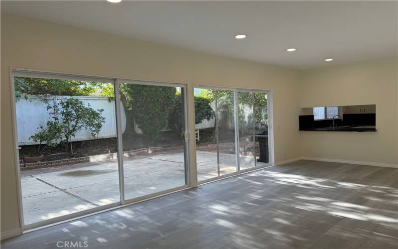 Kitchen has an opening to the family room.