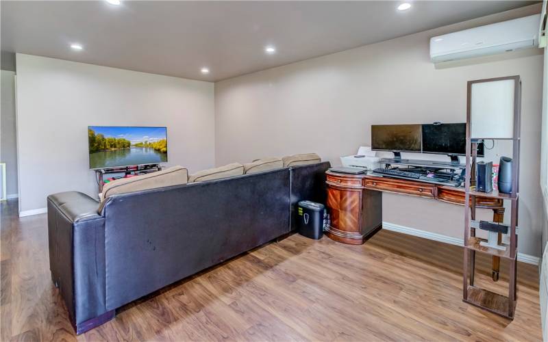 Spacious living room + work area.