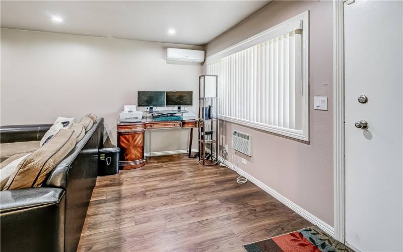 Spacious living room + work area.