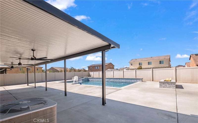 Beautiful alum-a-wood style patio cover with custom ceiling fans.