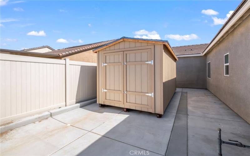 Large storage shed goes with the sale of the home