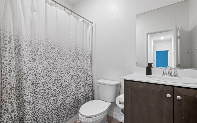 Guest bathroom with soaking tub