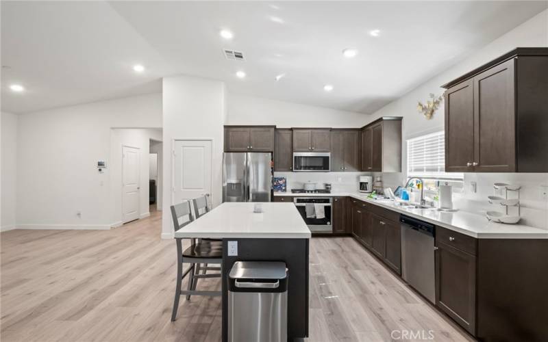 Kitchen open to the great room, and fireplace