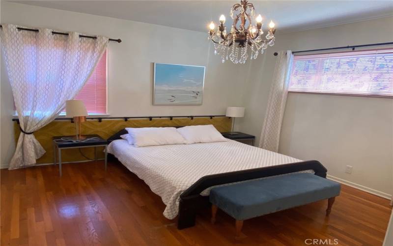 Primary Bedroom, light and bright, large closet and refinshed hardwood floor