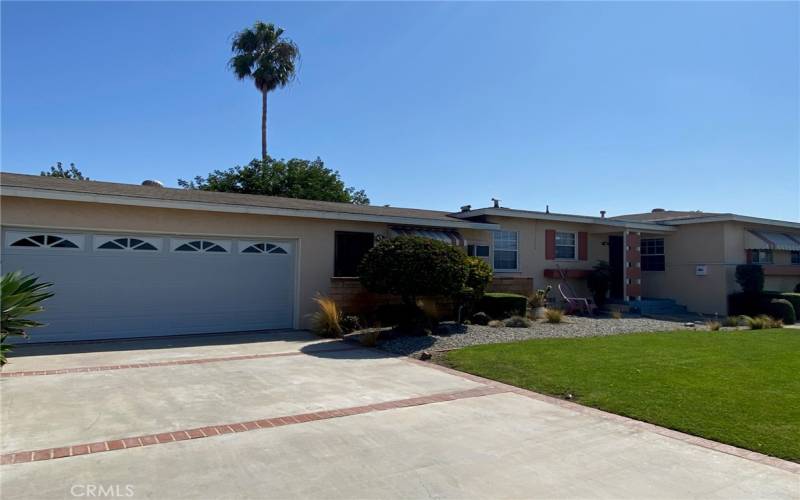 Front view from large driveway, 3 parking spots + 2 car Garage