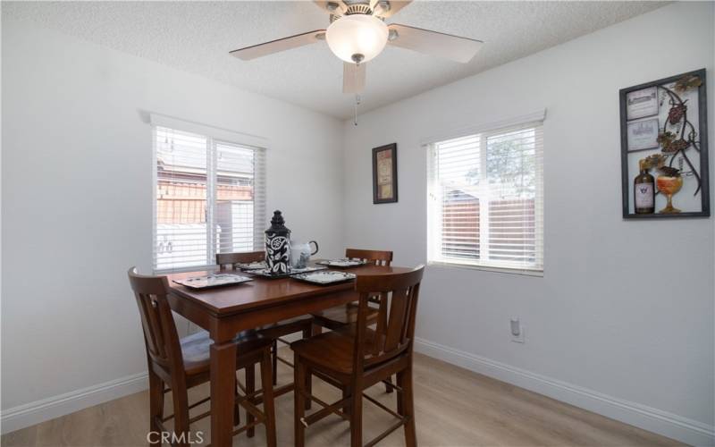 Dining area under a ceiling fan light