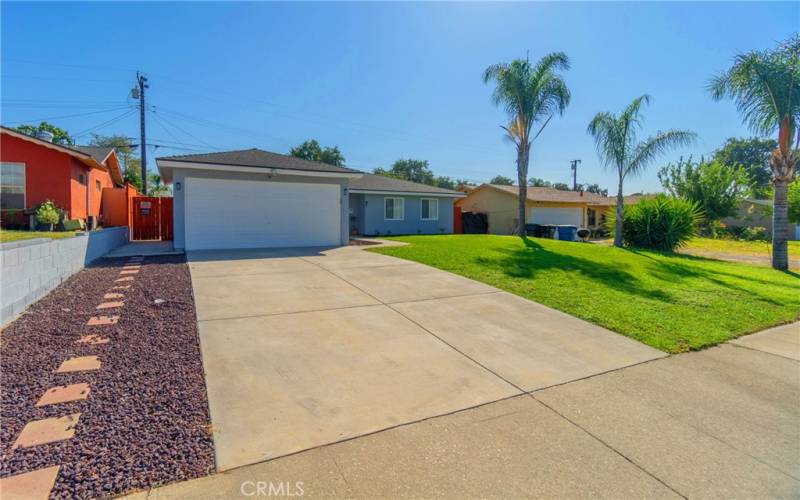 Manicured front lawn exudes curb appeal