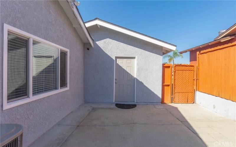 Side patio is a useful storage area