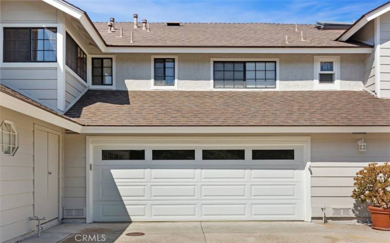 Front of home, single level, 2 car garage