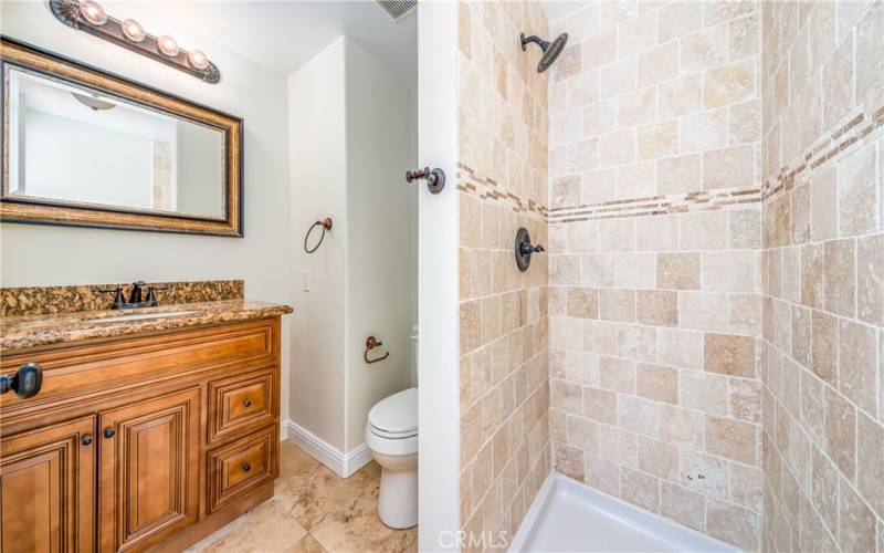 Bathroom located in Family Room area.