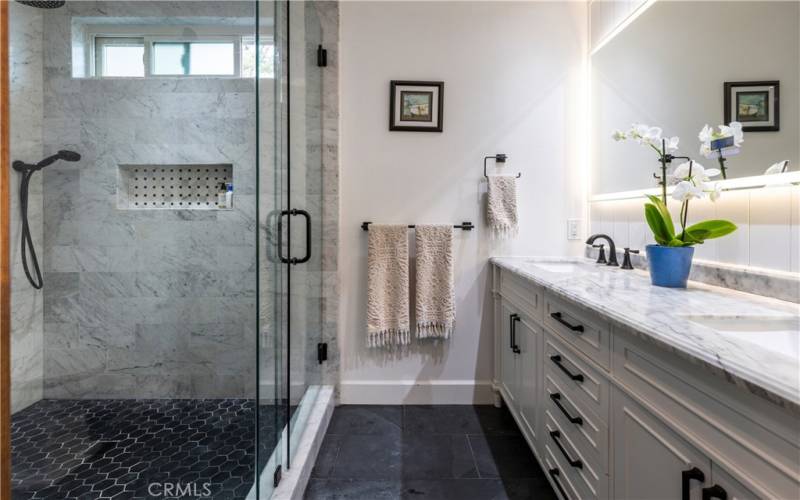 Top to bottom remodel of primary bath includes a floorplan redesign