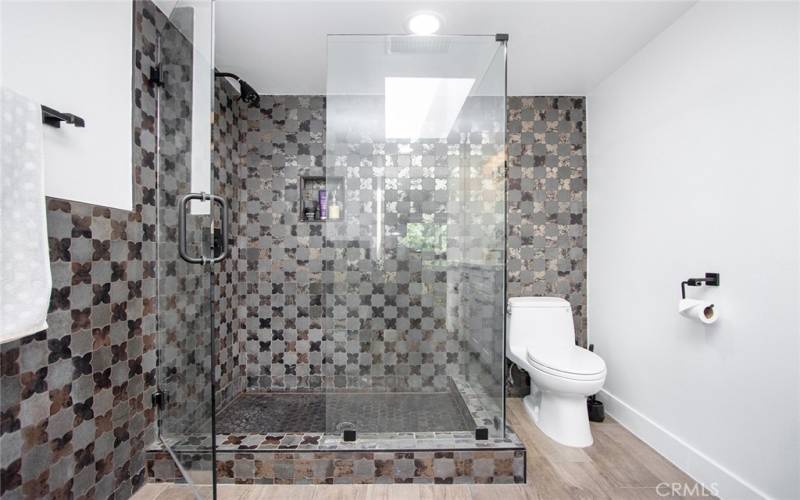 Large Primary Bathroom with Skylight