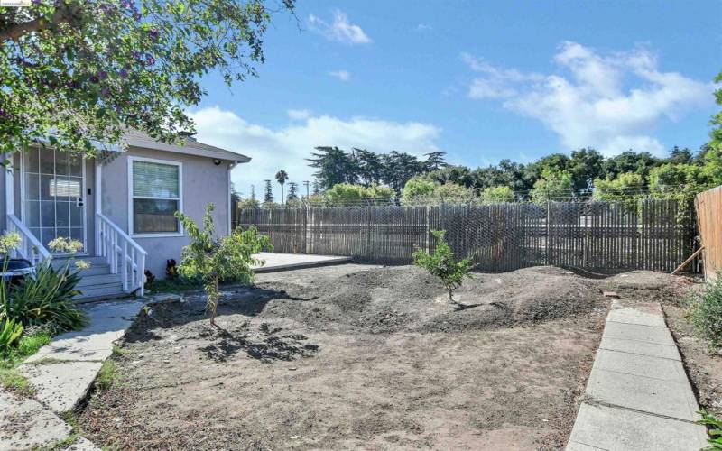 Backyard with view of separate entrance