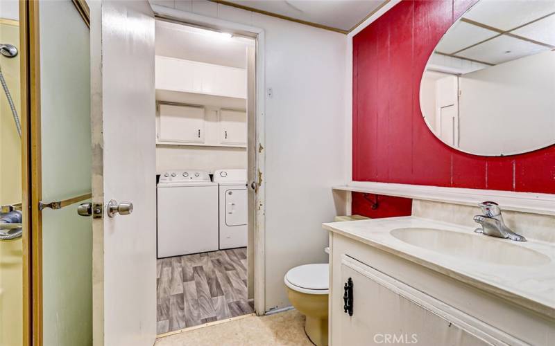 full bath connected to guest room and laundry area