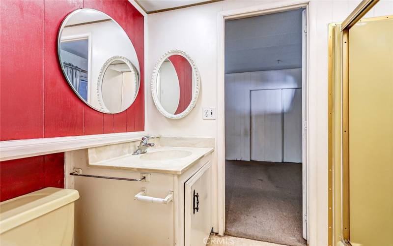 full bath connected to guest room and laundry area